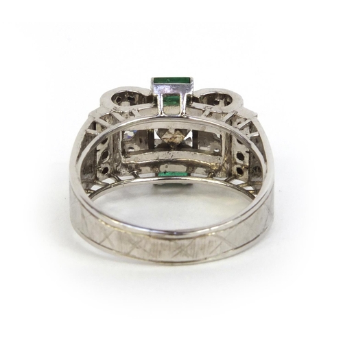 807A - Art Deco unmarked white gold diamond and emerald ring, size K, approximate weight 5.5g