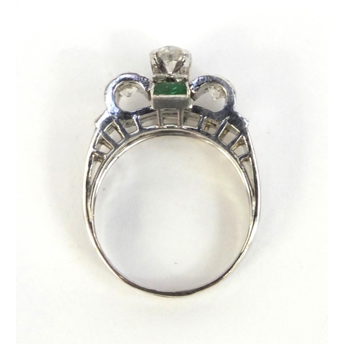 807A - Art Deco unmarked white gold diamond and emerald ring, size K, approximate weight 5.5g