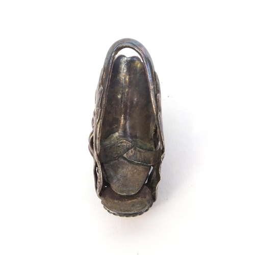 529 - Chinese unmarked silver dragon head ring set with coral, 4.5cm long, approximate weight 10.2g