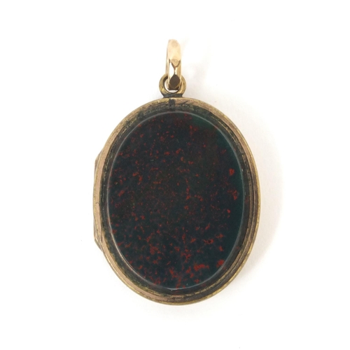 886 - Masonic bloodstone gilt metal locket, with engraved decoration, 3cm long, approximate weight 9.5g