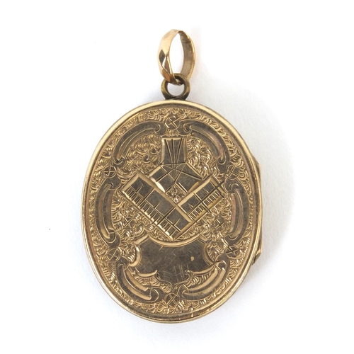 886 - Masonic bloodstone gilt metal locket, with engraved decoration, 3cm long, approximate weight 9.5g