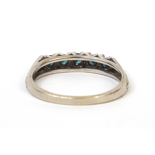 869 - 14ct white gold blue diamond half eternity ring, size P, approximate weight 2.9g