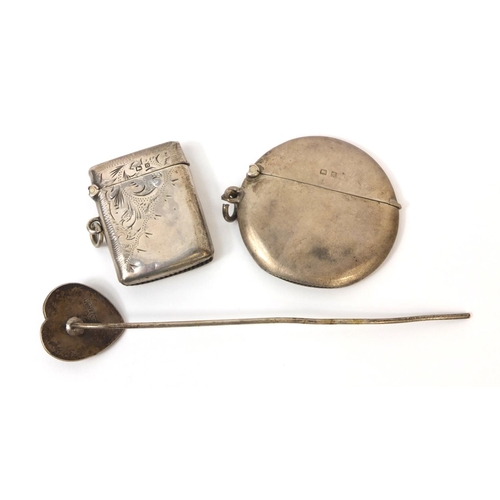 787 - Two silver vesta's - one circular and one rectangular and an Oriental Chinese silver tie pin, marked... 