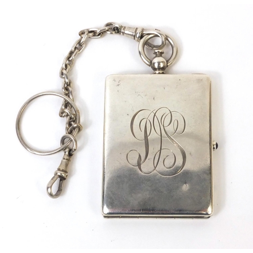 750 - Continental unmarked silver compact with gilt interior and silver chain, the compact 6.5cm long excl... 