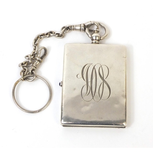 750 - Continental unmarked silver compact with gilt interior and silver chain, the compact 6.5cm long excl... 