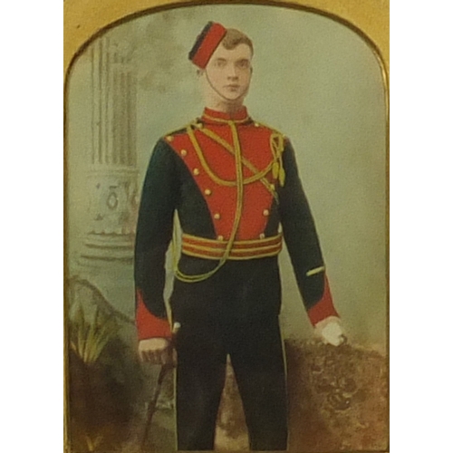 399 - Military interest hand coloured photograph of a gentleman standing in uniform with a swagger stick, ... 