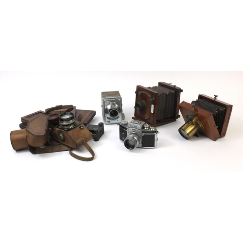 203 - Group of cameras including a Lancaster & Son of Birmingham mahogany plate camera, two Exacta cameras...
