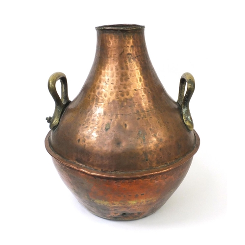 330 - Middle Eastern copper and brass twin handled vessel with Arabic script, 42cm high