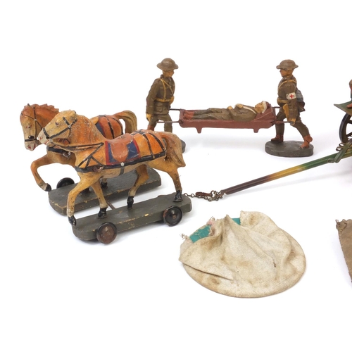 432 - Group of Military interest hand painted Elastolin soldiers comprising a stretcher and two horses pul... 