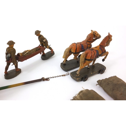 432 - Group of Military interest hand painted Elastolin soldiers comprising a stretcher and two horses pul... 