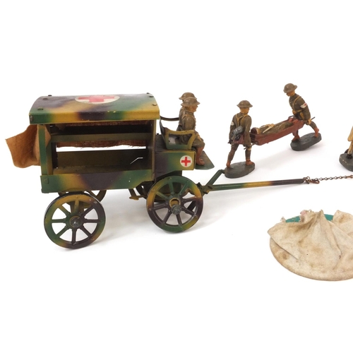 432 - Group of Military interest hand painted Elastolin soldiers comprising a stretcher and two horses pul... 