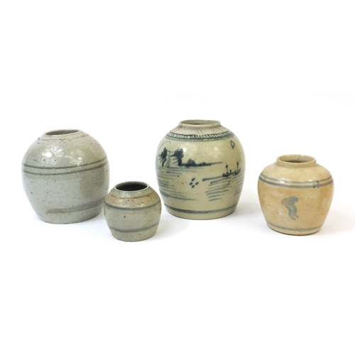 488 - Four Chinese stoneware ginger jars, one hand painted with a landscape scene, the tallest 16cm high