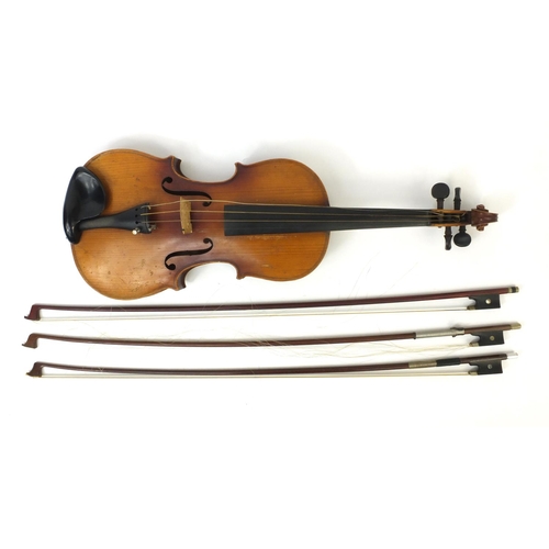 348 - Old wooden violin together with three bows and carrying case, the violin 59cm long