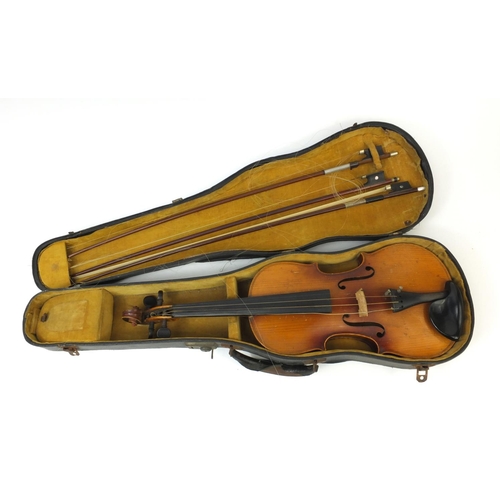 348 - Old wooden violin together with three bows and carrying case, the violin 59cm long