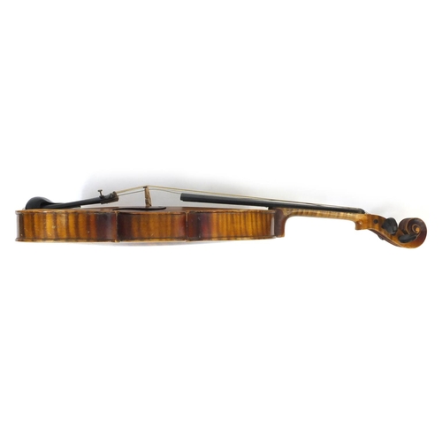 348 - Old wooden violin together with three bows and carrying case, the violin 59cm long