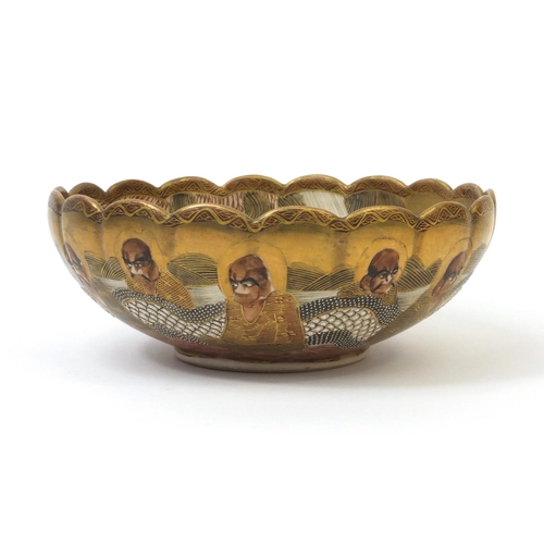 499 - Japanese Satsuma pottery immortals pattern bowl, character marks to the base, 18cm in diameter