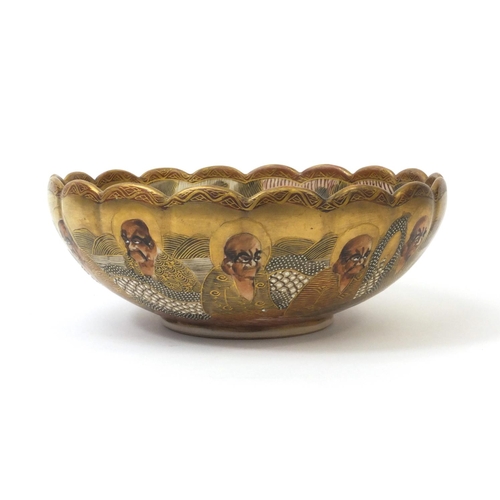 499 - Japanese Satsuma pottery immortals pattern bowl, character marks to the base, 18cm in diameter