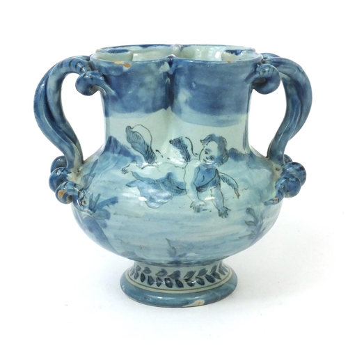 598 - Italian Cantagalli pottery twin handled vase hand painted with winged putti, factory marks to the ba... 