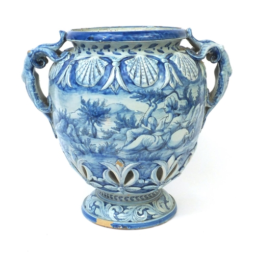 597 - Large Italian Cantagalli pottery twin handled vase with pierce decoration, hand painted with a recli... 