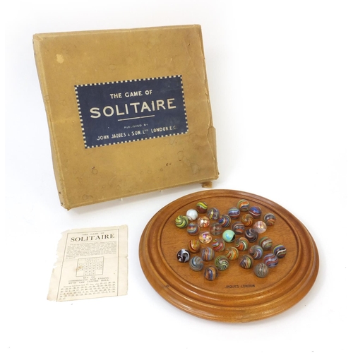 415 - Boxed John Jaques & Son the game of solitaire, including thirty three colourful glass marbles, the s... 