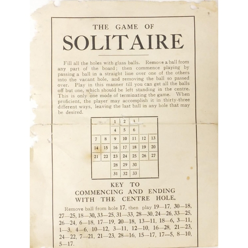 415 - Boxed John Jaques & Son the game of solitaire, including thirty three colourful glass marbles, the s... 