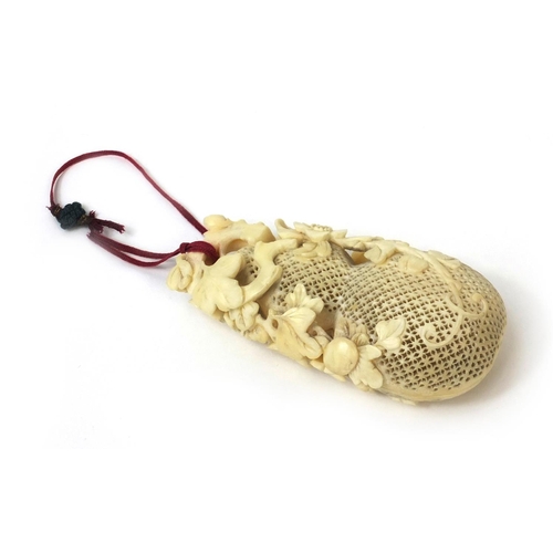 507 - Japanese carved ivory cricket cage in the form of a reticulated gourd, 10cm high