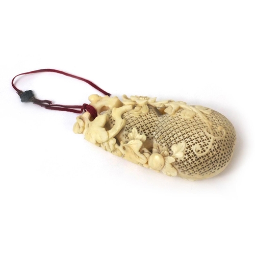 507 - Japanese carved ivory cricket cage in the form of a reticulated gourd, 10cm high