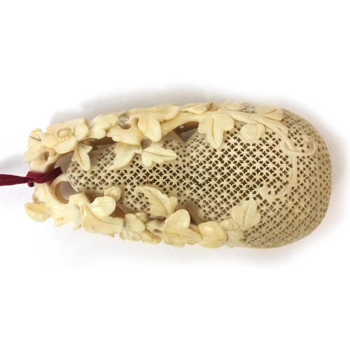 507 - Japanese carved ivory cricket cage in the form of a reticulated gourd, 10cm high