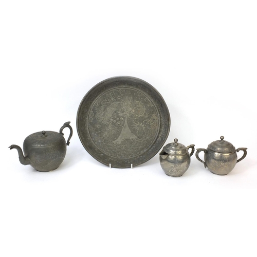 563 - Chinese Kut Hing three piece pewter tea service on tray each piece engraved with dragons, factory ma... 