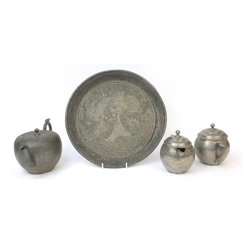 563 - Chinese Kut Hing three piece pewter tea service on tray each piece engraved with dragons, factory ma... 