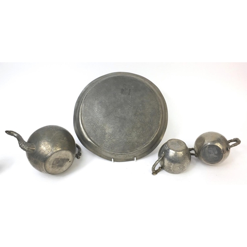 563 - Chinese Kut Hing three piece pewter tea service on tray each piece engraved with dragons, factory ma... 