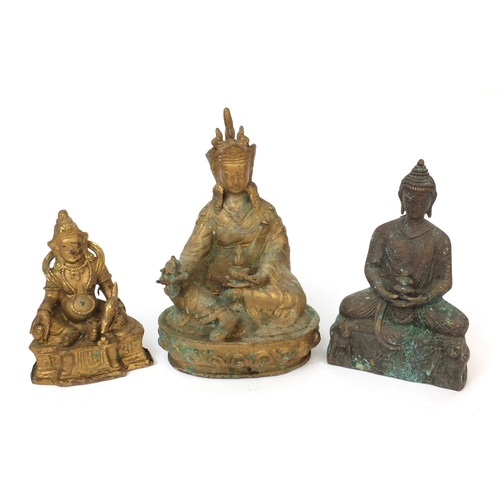 566 - Group of three Chinese cast metal Tibetan Buddha's, the tallest 23cm high