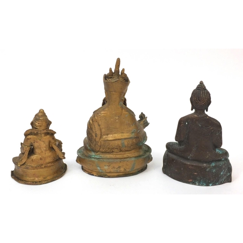 566 - Group of three Chinese cast metal Tibetan Buddha's, the tallest 23cm high