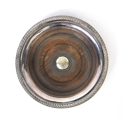 797 - Asprey silver plated and oak wine coaster with inset silver centre, hallmarked Sheffield 1963, 20cm ... 