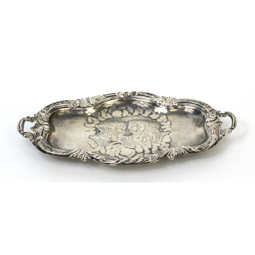 767 - Twin handled silver dish embossed with putti, hallmarked Birmingham 1904, 17cm long, approximate wei... 