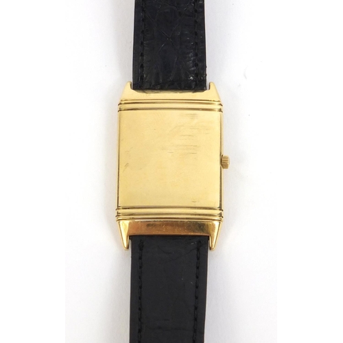 896 - 18ct gold gentleman's Jaeger-LeCoultre Reverso wristwatch with leather strap, approximately 3.3cm x ... 