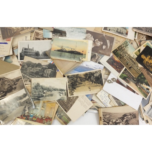 223 - Extensive collection of postcards including real photographic examples, some topographical and Milit... 