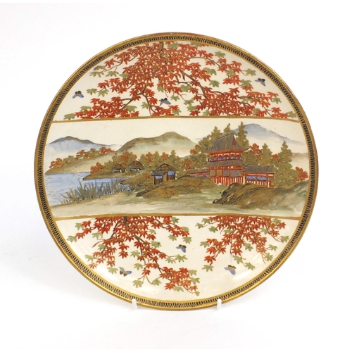 498 - Japanese Satsuma pottery plate hand painted and gilded with a landscape scene, character marks to th... 