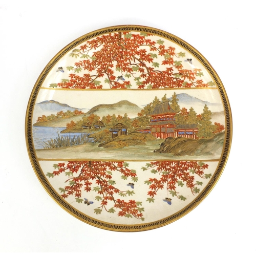 498 - Japanese Satsuma pottery plate hand painted and gilded with a landscape scene, character marks to th... 