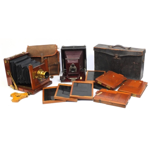 204 - Two folding plate cameras comprising a Reynolds & Branson of Leeds mahogany example together with a ... 