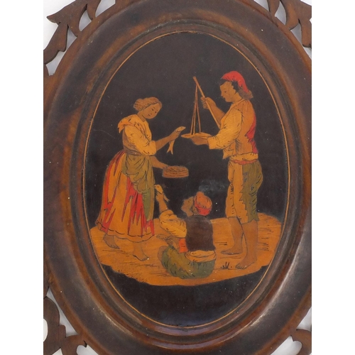 71 - Sorrento olive wood wall bracket pierced and inlaid with figures buying fish, 50cm high