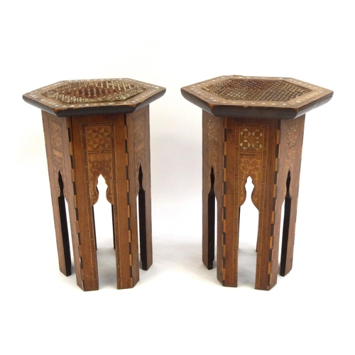 334 - Pair of hexagonal moorish tables inlaid with Mother of Pearl, each 48cm high x 30cm in diameter