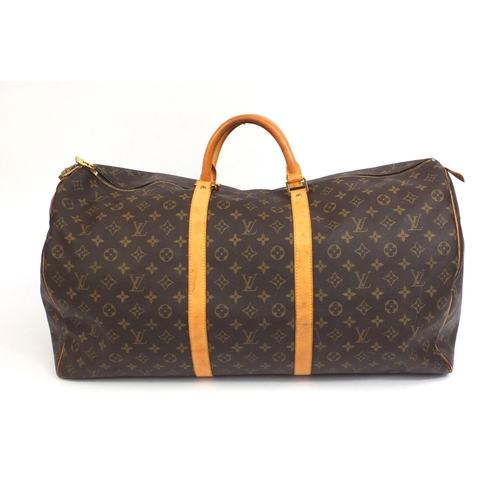 190 - Louis Vuitton monogramed leather keepall 50 holdall, approximately 35cm high excluding handles
