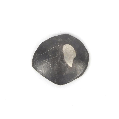 295 - Antique silver skeet, 1.5cm in diameter