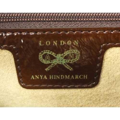198 - Anya Hindmarch brown leather handbag together with an Anya Hindmarch leather and suede purse, both w... 