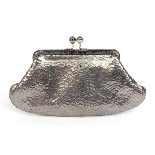 199 - Anya Hindmarch silver colour leather clutch bag, label to the interior, 13cm high