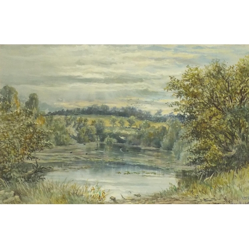 948 - Herkis Nisbet - Victorian watercolour study of a lake before a landscape setting, dated 1877, mounte... 