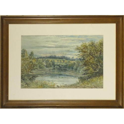 948 - Herkis Nisbet - Victorian watercolour study of a lake before a landscape setting, dated 1877, mounte... 