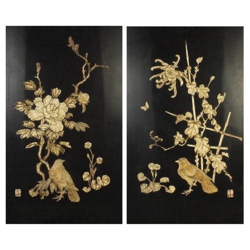 580 - Two Oriental lacquered panels with bone relief decoration, decorated with birds and peonies, both wi... 