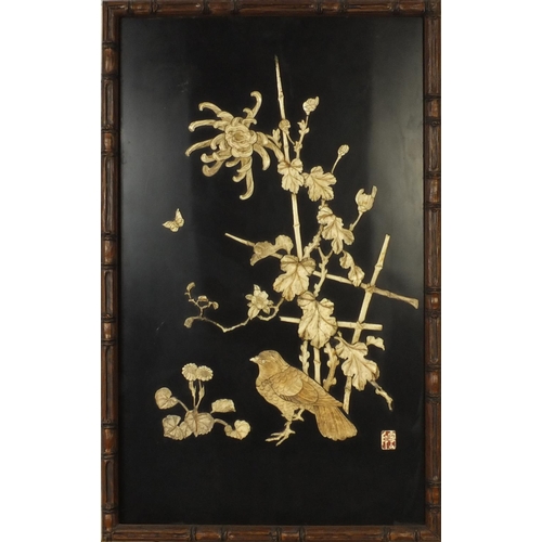 580 - Two Oriental lacquered panels with bone relief decoration, decorated with birds and peonies, both wi... 